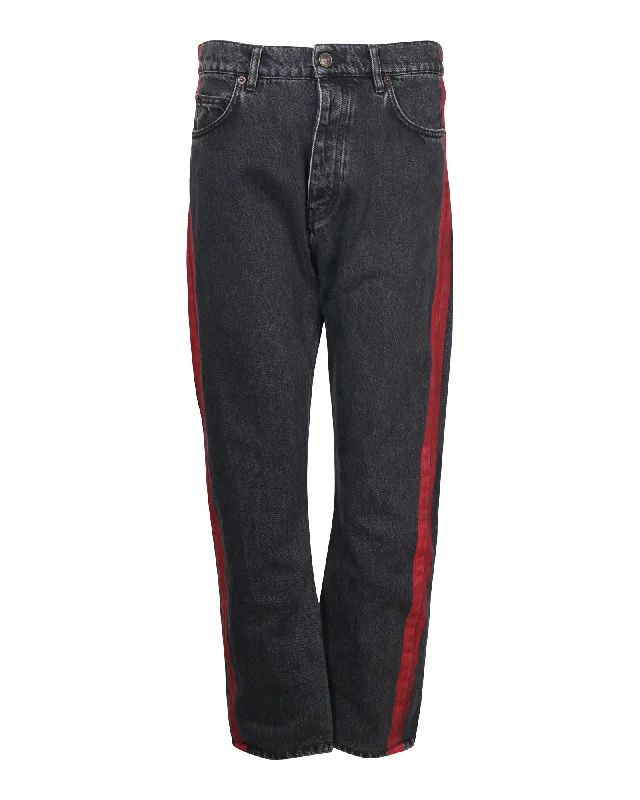 Men's Jeans with a Zip - Off Lower Leg for Convertible StyleBalenciaga Denim Jeans with Red Stripe Detail in Black Cotton