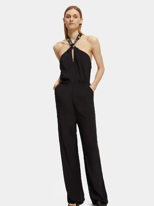 Denim women jumpsuits with ripped details for a casual - edgy lookContrast bow jumpsuit