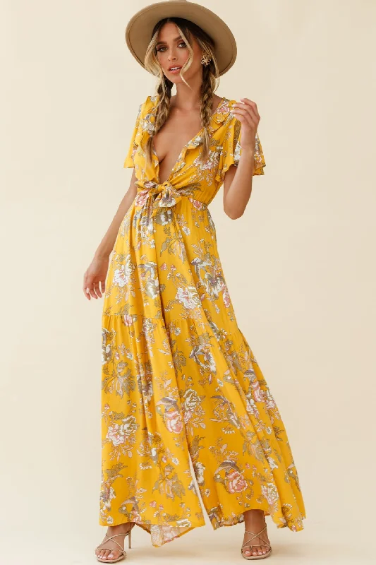 Women jumpsuits with geometric prints for a modern and contemporary aestheticKasey Tied Bust Wide Leg Floral Print Jumpsuit Mustard