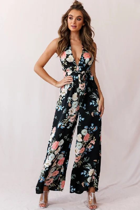 Printed women jumpsuits for a fun and casual day out shoppingMake Me Halterneck Low Back Jumpsuit Floral Print Black