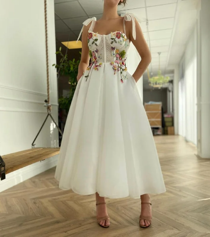 Midi dresses with pleated skirts for a timeless and elegant appealAlicia Wonderflowers Bridal Dress