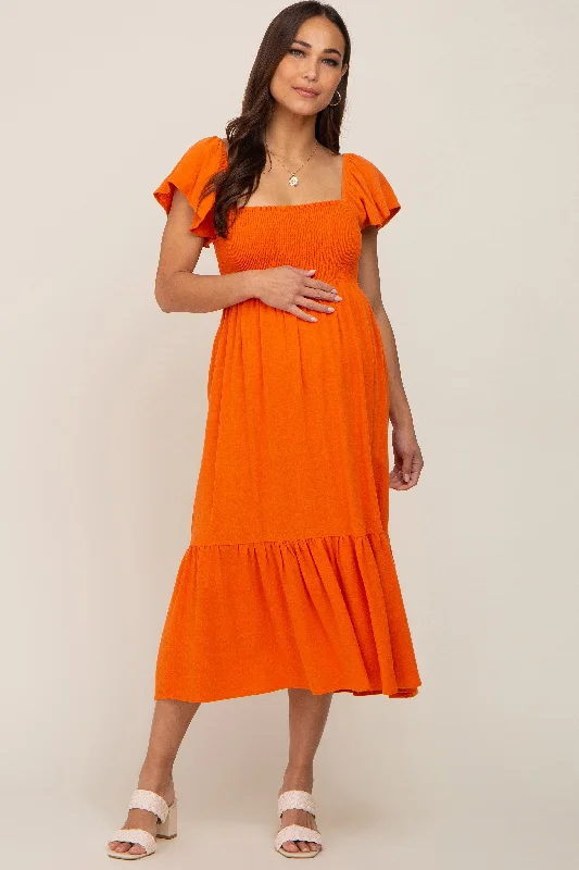 Midi dresses with ribbed textures for a unique and tactile appearanceOrange Smocked Ruffle Hem Maternity Midi Dress