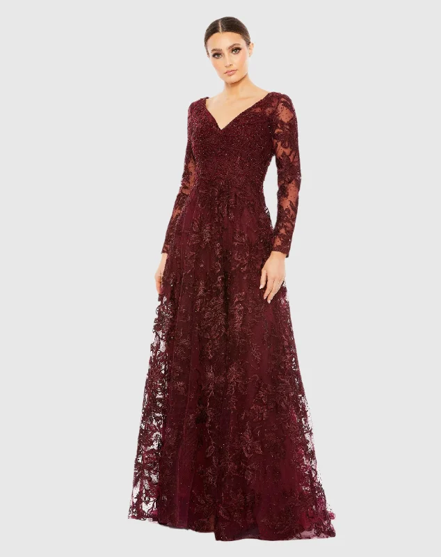 Maxi dresses with a criss - cross back for a flirty and unique detailEmbellished Illusion Long Sleeve V Neck Gown