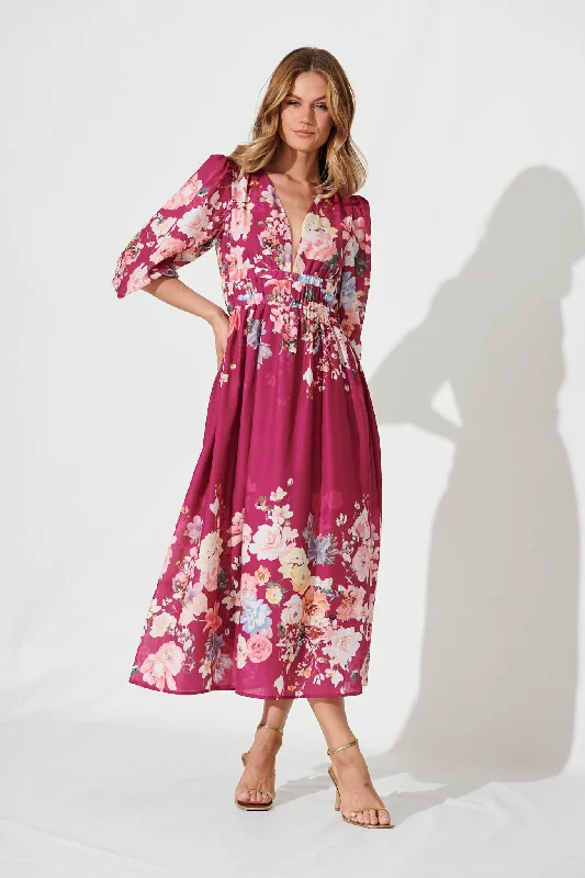 Ruffled maxi dresses with a tiered skirt for added volumeCamie Maxi Dress In Magenta With Blush Floral