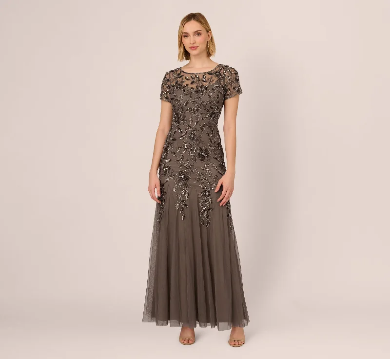 Metallic maxi dresses for a glamorous New Year's Eve partyHand Beaded Short Sleeve Floral Godet Gown In Lead