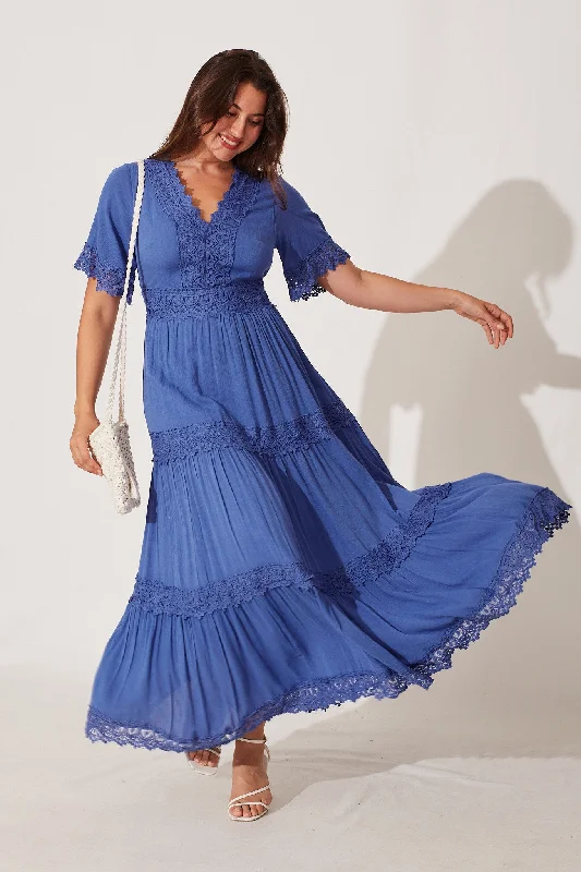 Maxi dresses with a ruffled neckline for a charming lookMona Maxi Dress In Blue