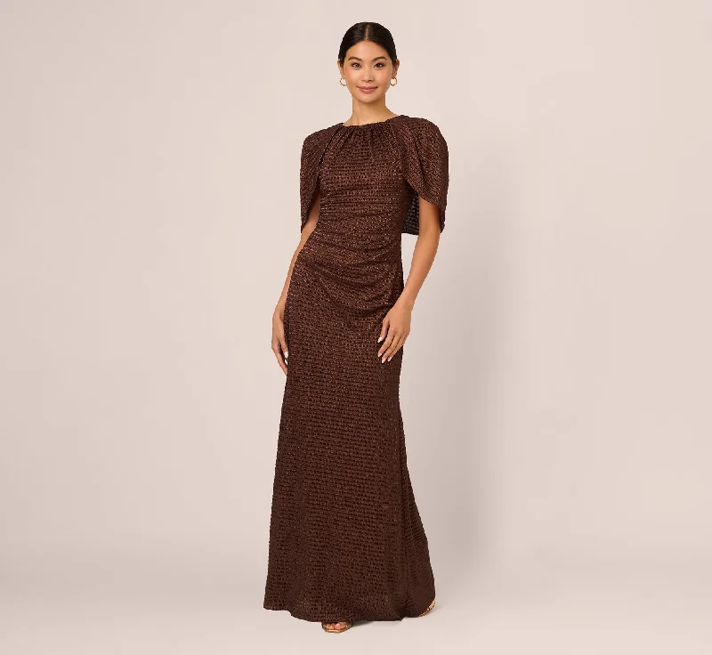 Maxi dresses with thin spaghetti straps for a delicate and feminine feelPleated Metallic Cape Gown In Bronze