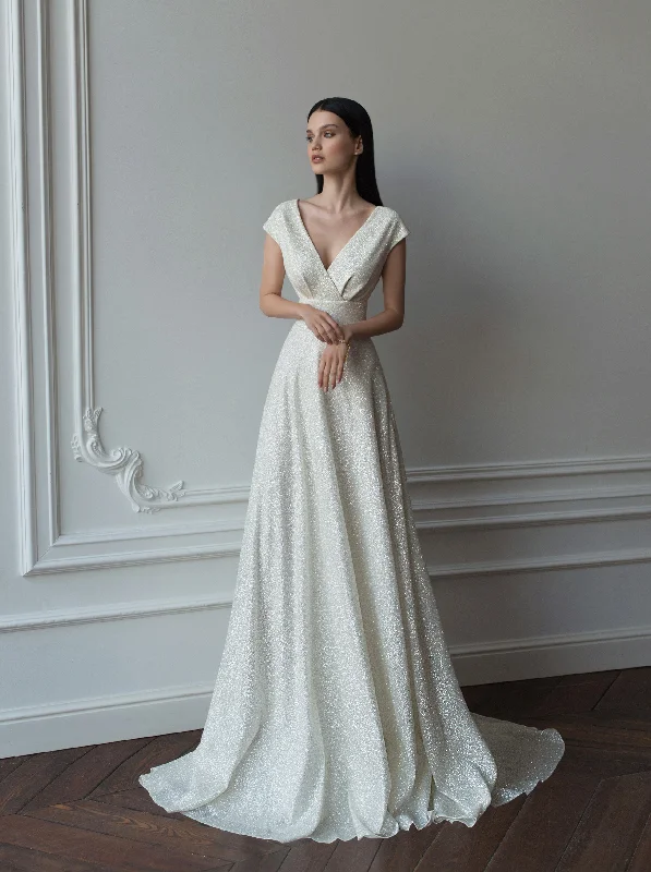 Wedding guest dresses with pom - pom trims for a playful lookCape Sleeve Glitter Wedding Gown