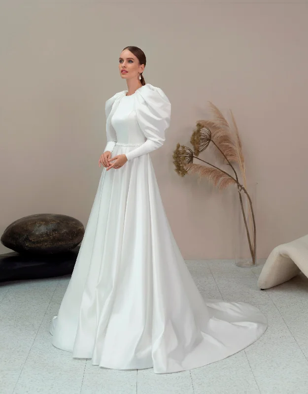 Wedding guest dresses with cut - out details and midi lengthsLong Sleeve Elegant Modest Wedding Dress