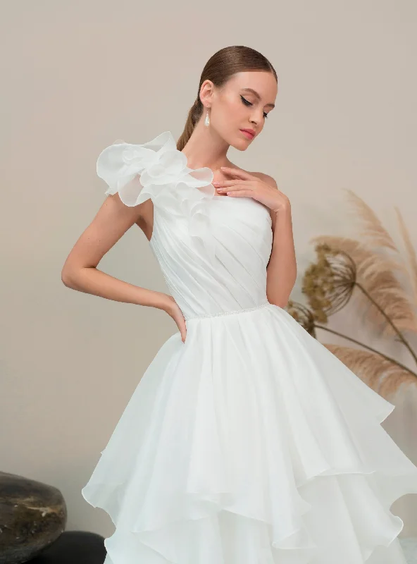 Wedding guest dresses with ruched bodices and spaghetti strapsOne-Shoulder Wedding Gown with Playful Skirt