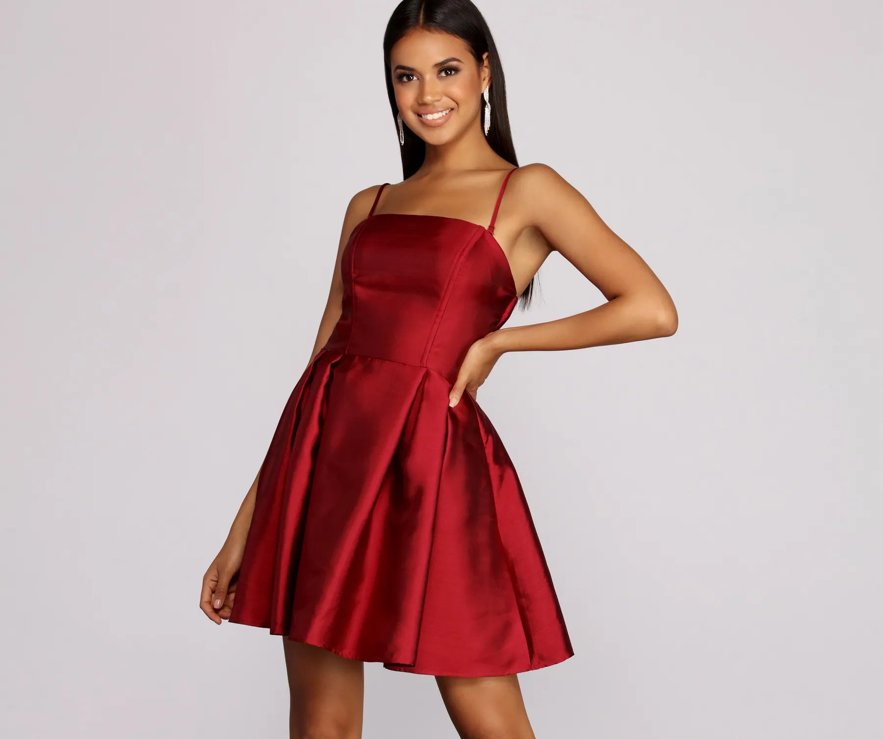 Mini dresses with pom - pom trims for a playful feelRebecca Party Pleated Dress