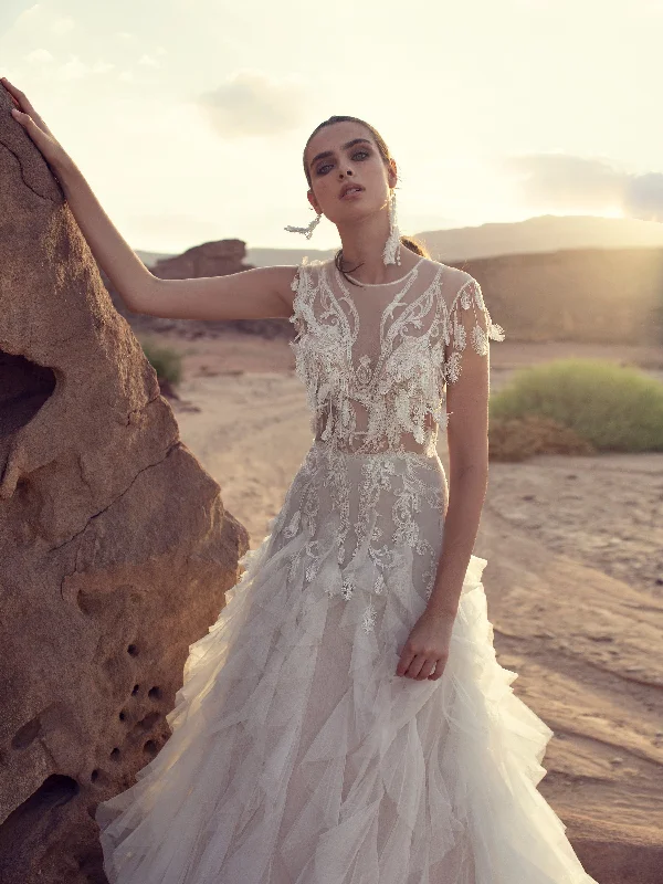 Wedding guest dresses with fringe accents for a bohemian - inspired weddingSleeveless Ruffled Bohemian Wedding Gown