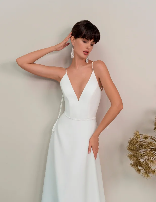 Wedding guest dresses with abstract prints and long trainsSpaghetti Strap Chic A-Line Wedding Dress