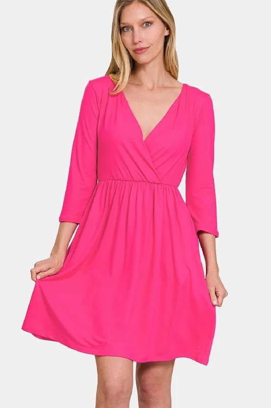 Plus Size Women Dress with a Flattering A - Line Cut for Comfort and StyleElegant surplice dress with pockets and three-quarter sleeves